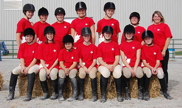 Jeannine and members of the Stillbrook Riding Stables team